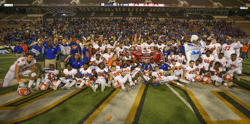 The Madison Central Jaguars celebrate after claiming the football team’s first state championship since 1999 with a 24-17 win over Brandon High School in the Class 6A state championship Friday night in Hattiesburg.