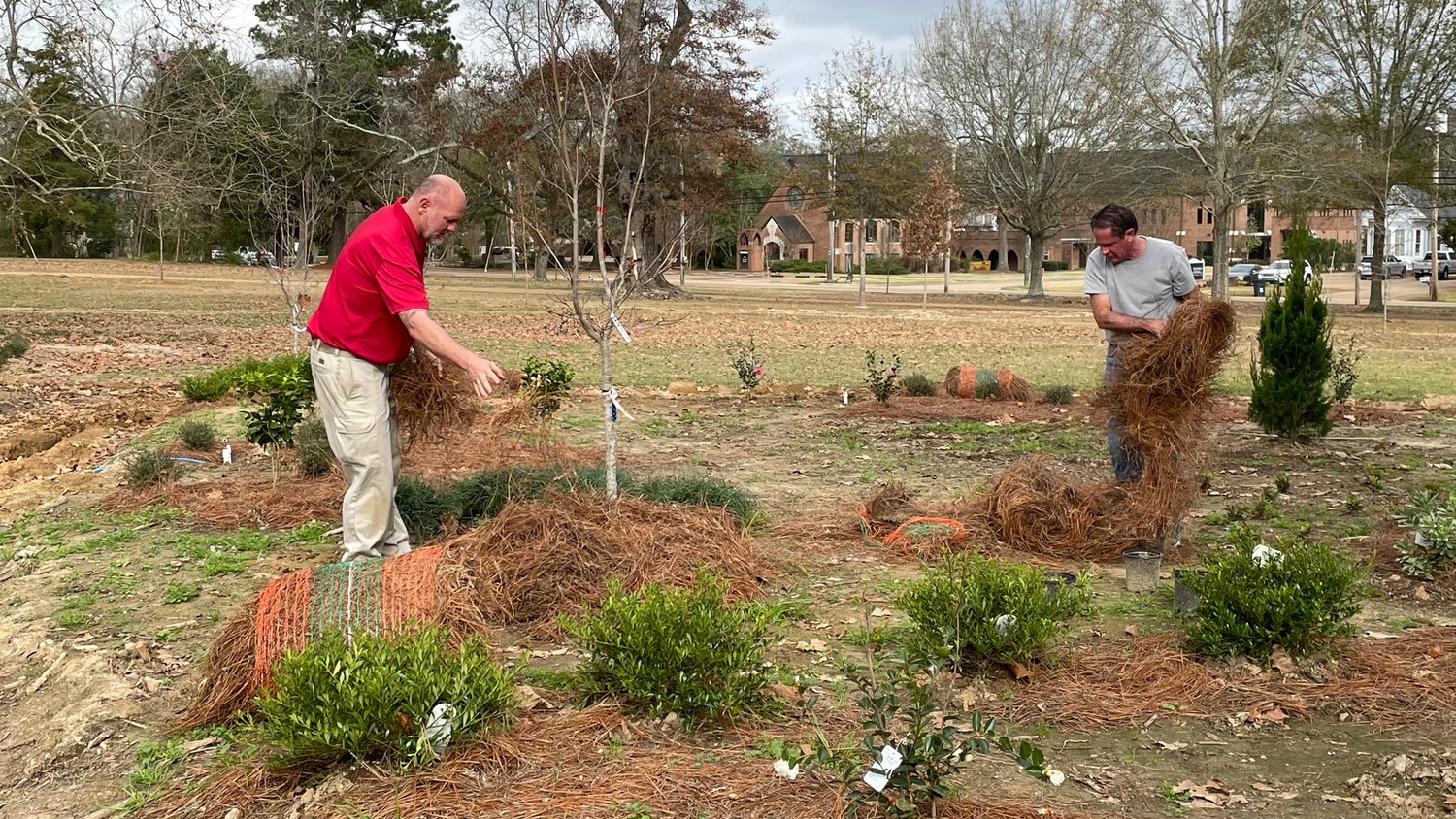 Alan Hoops, at right, landscape architect and director of environment and design for Madison, and Gary Tolbert, superintendent of parks and recreation, work on the Madison Station Botanic Garden, which broke ground in April on the historic Montgomery House grounds. City officials hope to have Phase II of the garden finished by April 2022.
