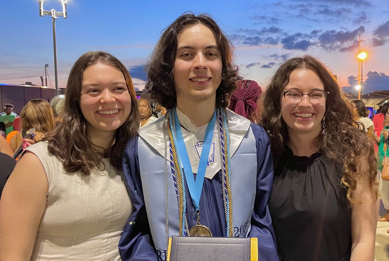 Juliette Richert, Valedictorian of the Class of 2016; Allen Richert, Valedictorian of the Class of 2023; and Claire Richert, Valedictorian of the Class of 2020, gather for a photo May 17, at the Ridgeland High School graduation at the Mississippi Coliseum in Jackson.